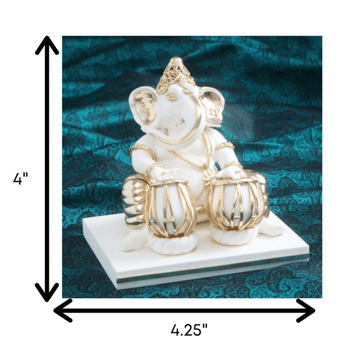 Ganesha (playing Tabla)