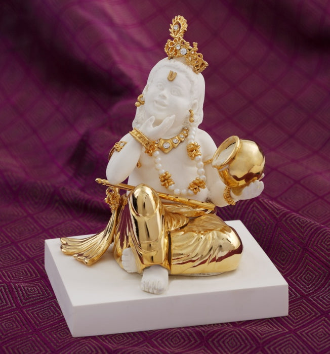 Krishna (eating butter)
