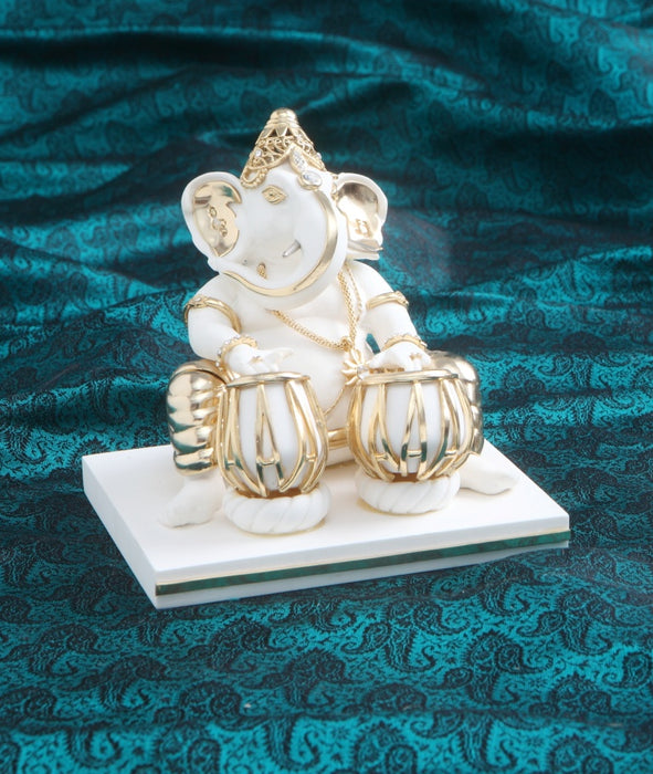 Ganesha (playing Tabla)